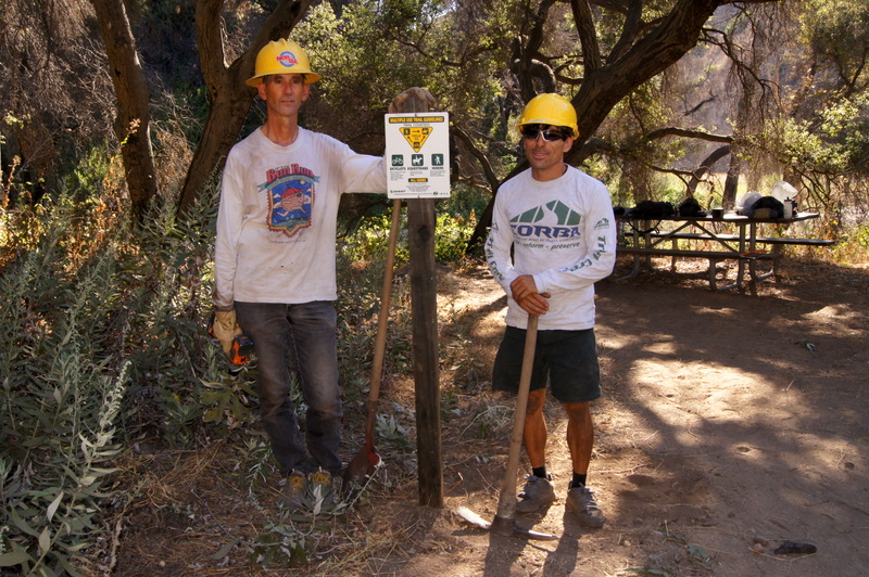 Banner and Steve with the newly installed sign Banner and Steve with the newly installed sign
