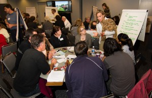 Facilitators seek public input from each table