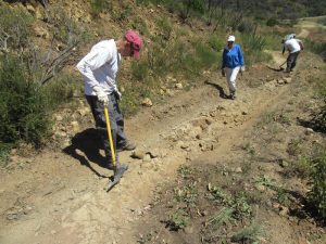 Fixing a rut on the Sin Nombre Trail