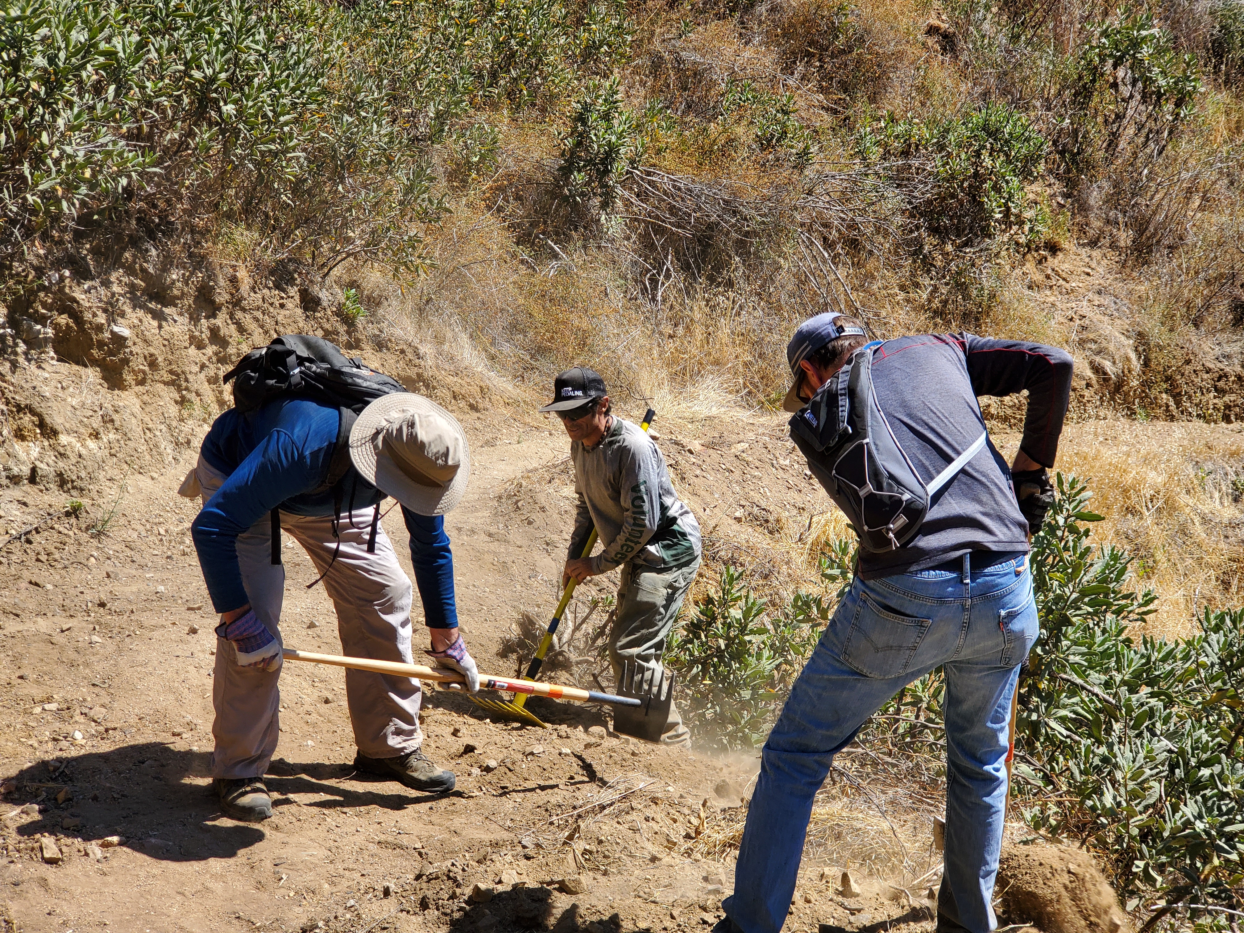 Constructing a rolling-grade dip drain
